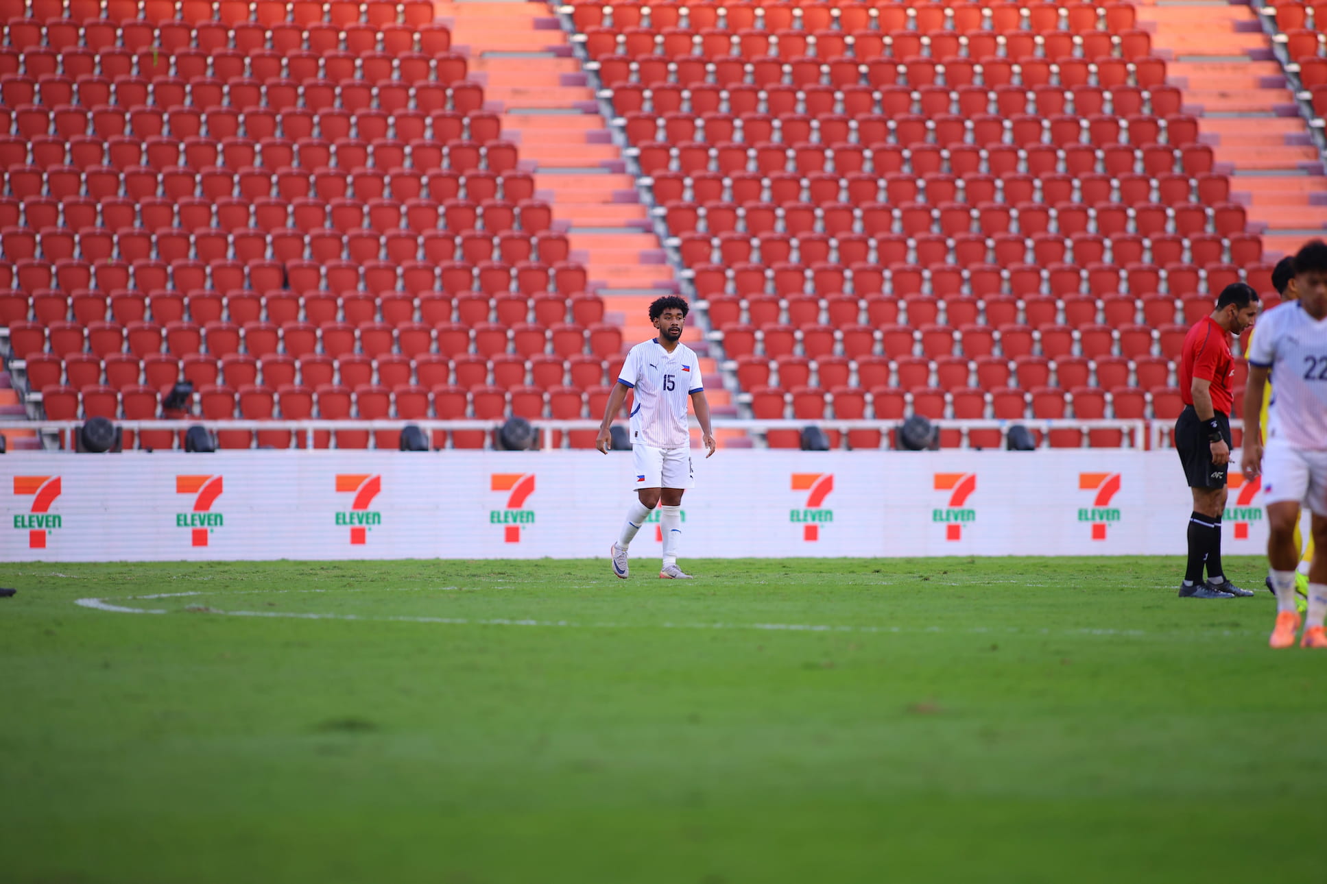 Nico standing on the field inside a stadium